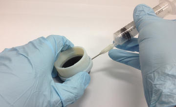 Filling gel with a syringe